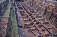 113374953-empty-dry-dock-for-repair-of-large-ships-.jpg